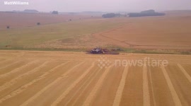 Farmers are falling foul of the summer heatwave after two expensive combine harvesters were spotted on fire