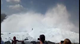 Tourists stunned as gigantic waves batter Bali coast