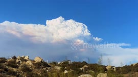 Time lapse shows smoke cloud from fast-moving Cranston Fire
