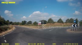 Van driver makes a shocking turn into oncoming traffic