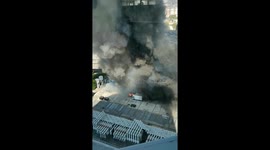 Black smoke billows into air after fire at electricity plant near Paris