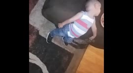 Kid sleeping standing up