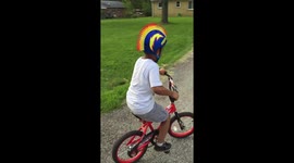 Bike crash kid learning to ride his bike