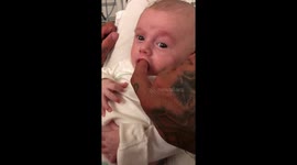Hungry baby gives dirty look