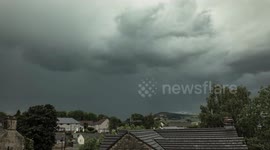A storm hits a small village in West Yorkshire, UK. Lots of dark clouds pass over smoothly in this time lapse