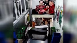 Father and son narrowly escape being swallowed by malfunctioning escalator
