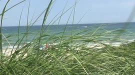 People enjoying beaches Block Island, RI