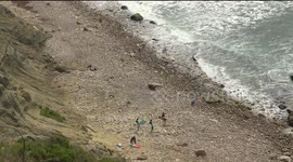 People enjoying beaches at Mohecan Bluffs, RI