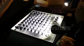 Mesmerizing metal filings moving to music.