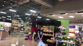 Jumping over stranger in super market