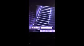 Drunk guy falls down strip club stairs