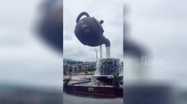 Giant teapot sculpture pours water in northern China