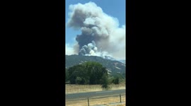 Huge plumes of smoke from Mendocino Complex fires seen from freeway