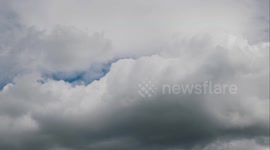 4K Time lapse of some gentle summer clouds floating through the sky in July 2018