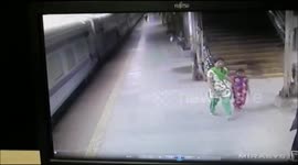 Man slips from moving train Rescued by Railway Protection Force (RPF) Mumbai India