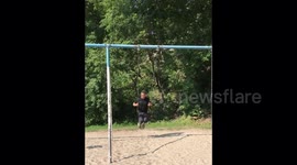 YouTuber dad shows off amazing swing trick in front of daughter