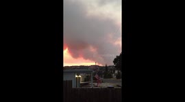 Smoke from Ranch Fire drifting over Clearlake Oaks at sunset