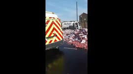 Major UK road closed after lorry crash sends thousands of Coke fans onto road
