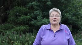 A woman says she's living in darkness because of a 42ft tree behind her home -- despite forking out £380 to get the council to cut it back a year ago.