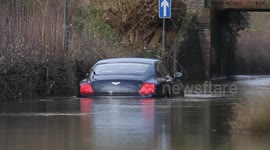 Man gets £100,000 Bentley stuck in flood water
