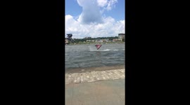 Man does crazy 360 flips on a jetski at Pittsburgh regatta