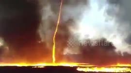 Amazing footage shows firenado spinning into air during blaze at UK plastic pallet factory