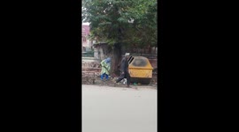 women is cleaning garbage