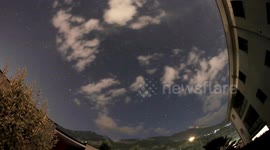 spooky nightsky timelapse with distant storm