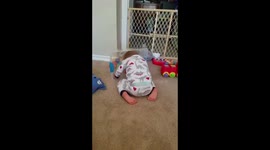Toddler banging head in toy bin