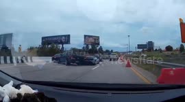 Speeding McLaren supercar gets shunted from behind by car