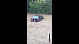 Video shows car half-submerged as torrential rain floods Pennsylvania towns