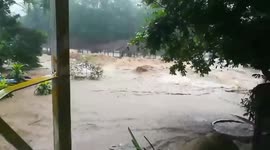 Swollen river after flash floods in Thailand