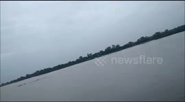Heard of elephant  swims as the river is flooded in Indo Nepal Boder.
