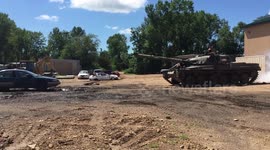 Tourists Smashes  Cars with a real Tank in minnesota