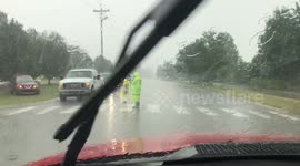School Crossing Guard working rain or shine.