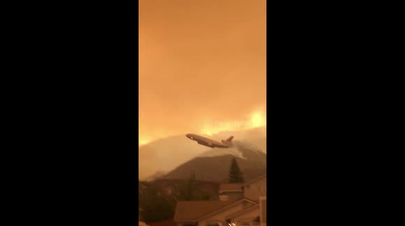 'Like being in a war zone': Jumbo jet bombs California wildfire