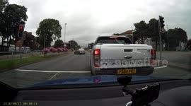 Idiot drives too close and can't stop when lights change red.