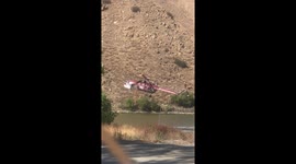 Helicopters filling with water at Corona Lake for Holy Fire