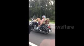 Florida motorcyclist uses his feet to steer while on motorway