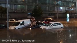 Heavy rains turn streets in Ukraine's capital into rivers
