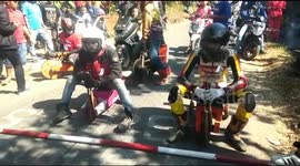Locals in Indonesia hurtle down hills at 40mph on wooden tricycles