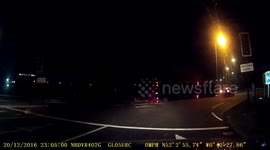 Moment Royal Mail lorry overturns after steering around roundabout