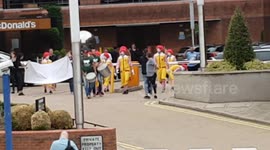 Clowns protesting