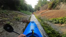 RAW: Three kayakers race down storm drain at 50mph
