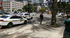 Armed AFT agent runs towards shooting area