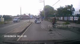 Motorcycle Duo Collide With Tricycle