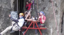 Drone footage shows adrenaline junkie proposing to girlfriend while sitting on bench suspended 330ft in air