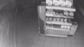 A stupid burglar is behind bars after falling through a Tesco ceiling during a failed robbery