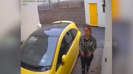 A woman was caught on CCTV ‘going for a poo’ on a driveway in broad daylight