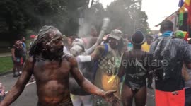 NYC: J’Ouvert Revellers Dance with Powder, Body Paint at Daybreak